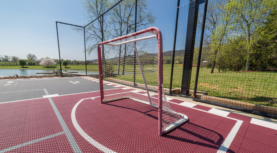 Portable hockey goal on a VersaCourt rink
